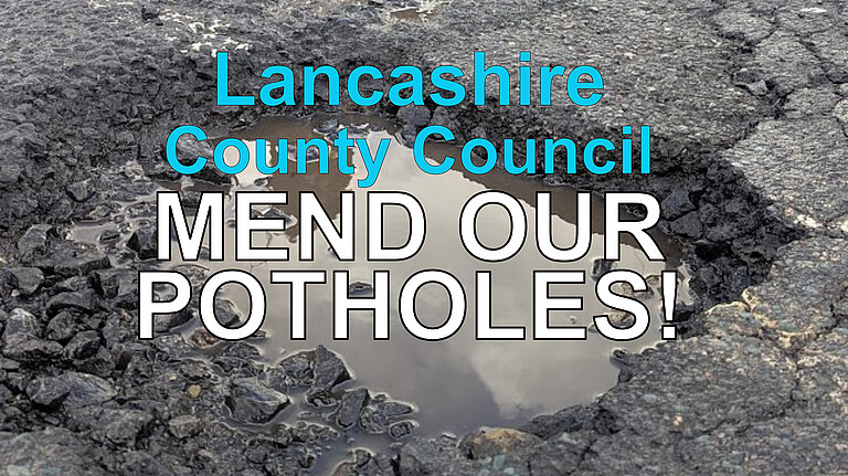 Picture of pothole with Mend Our Potholes superimposed.